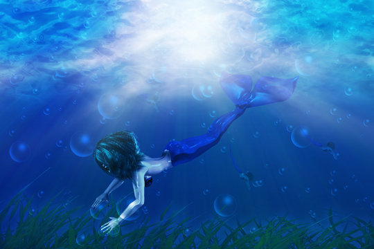 Beautiful mermaid swimming