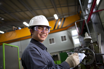 asian male industrial mechanic