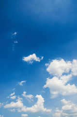 Cloudscape of bright blue sky