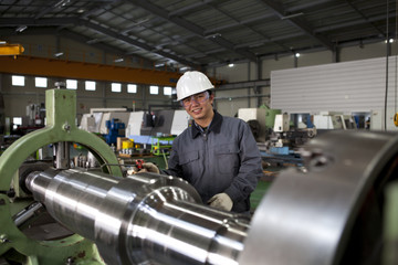 asian technician working in factory