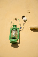 decorative lamp on old wall