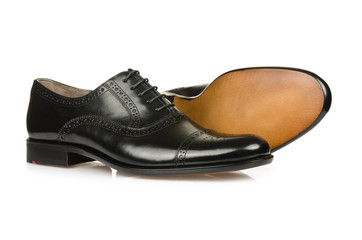 Fashion concept with male shoes on white