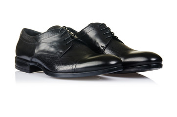 Fashion concept with male shoes on white