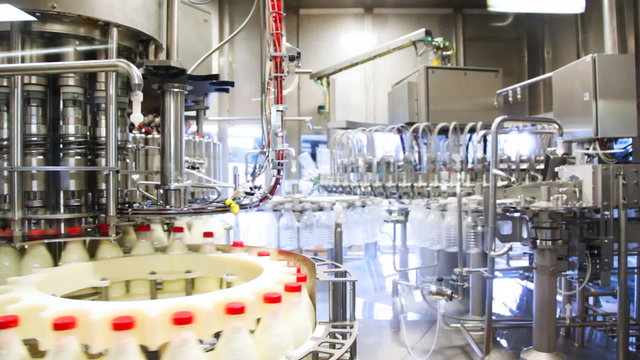 bottles washed and left appear already filled milk at factory