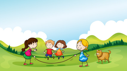 Obraz na płótnie Canvas Children playing jumping rope