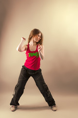 Zumba dancing woman in studio