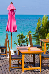 Table and chairs with a beautiful sea view , Thailand.