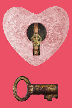 Pink stone heart with keyhole and old key