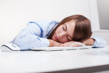 Beautiful woman tired at work