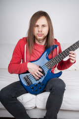 young guitarist playing guitar