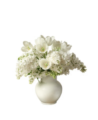 The bouquet of white flowers in a white vase
