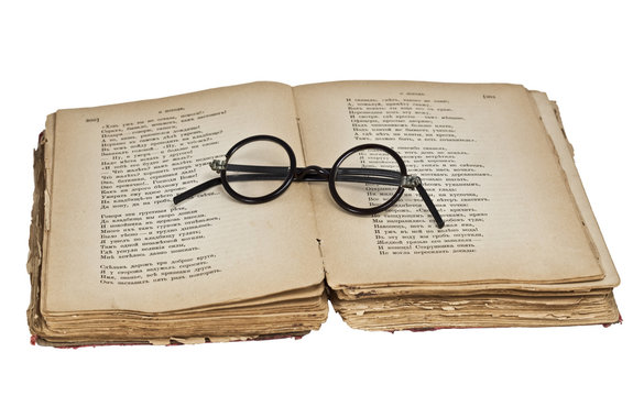 The old glasses in an ancient book