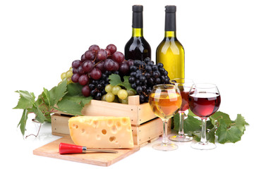 bottles and glasses of wine, assortment of grapes and cheese