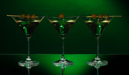 Martini glasses on dark background