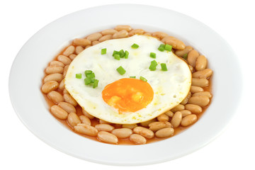 fried egg witn green onion and white beans in sauce