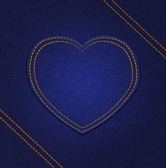 Jeans heart on blue denim background
