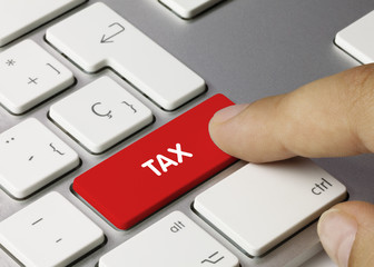 Tax keyboard key. Finger