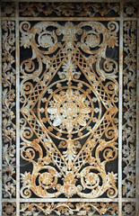 Ornate tomb door in the Pere Lachaise cemetery, Paris