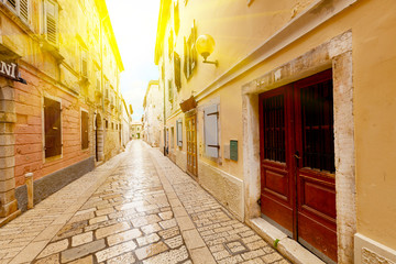 Fototapeta na wymiar Narrow Street in the City of Rovinj, Croatia