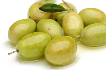 Green olives and leaves