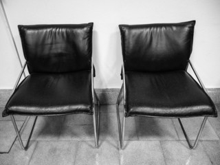 Chairs in a waiting room B&W image