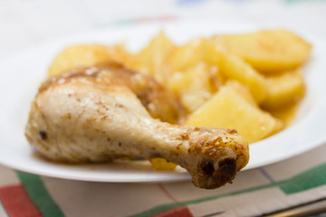 chicken leg and potatoes