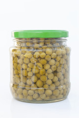 Canned green peas in glass jar