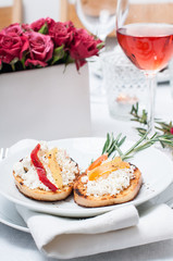 appetizer, toast with cheese, pepper and rosemary