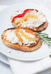 appetizer, toast with cheese, pepper and rosemary