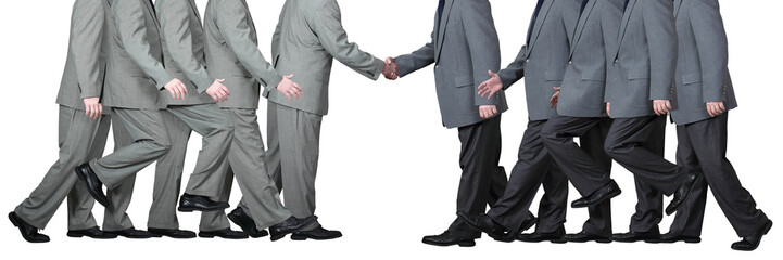 Two Businessmen Shake Hands