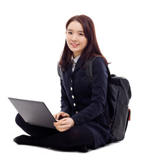 Yong pretty Asian student studying whit laptop