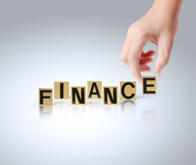 Hand and word Finance