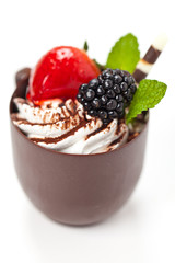 Hand made chocolate coffee cup filled whith mousse cream