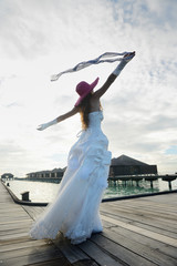 Obraz premium asian bride on beach