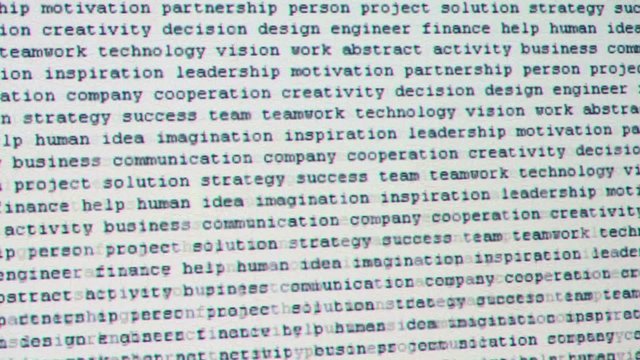 Black motion text projection on light color wall