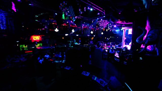 Many people in dark night club
