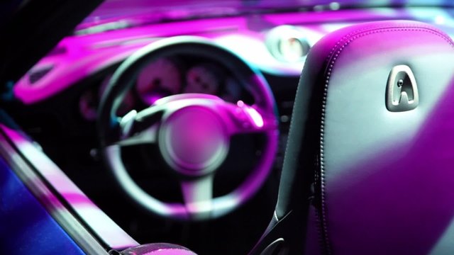 Cabriolet cabin in colorful illumination
