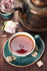 Obraz na płótnie Canvas Сup of tea and a vintage teapot