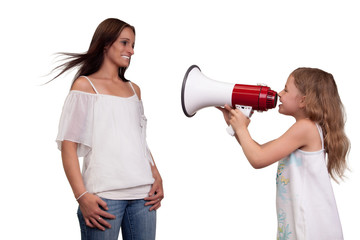Little girl shouting at Mum with a megaphone