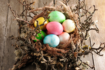 Colored easter eggs in nest
