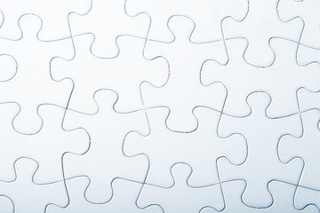 Fototapeta premium Jigsaw puzzle with blank white pieces