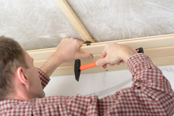 Wood panelling the ceiling