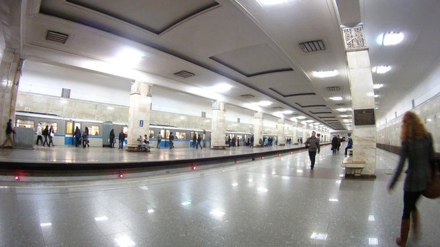 Passengers come and leave on metro station Partizanskaya