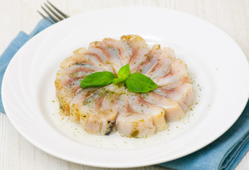 pieces of salt herring fish