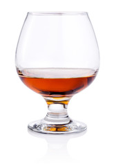 Glass of or brandy isolated on white background
