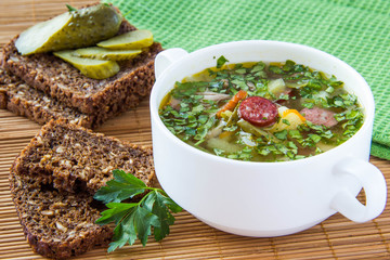 Russian traditional soup with pickled cucumber and meat