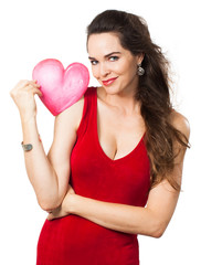 Beautiful seductive woman holding red love heart.