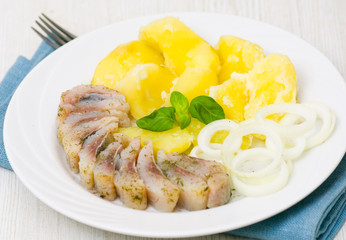 Herring fillet with potatoes and onions