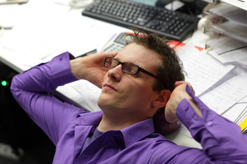 young business professional man,relaxing neck and relieving pain