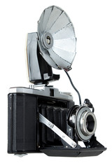 Vintage folding camera with bulb flash ,  isolated